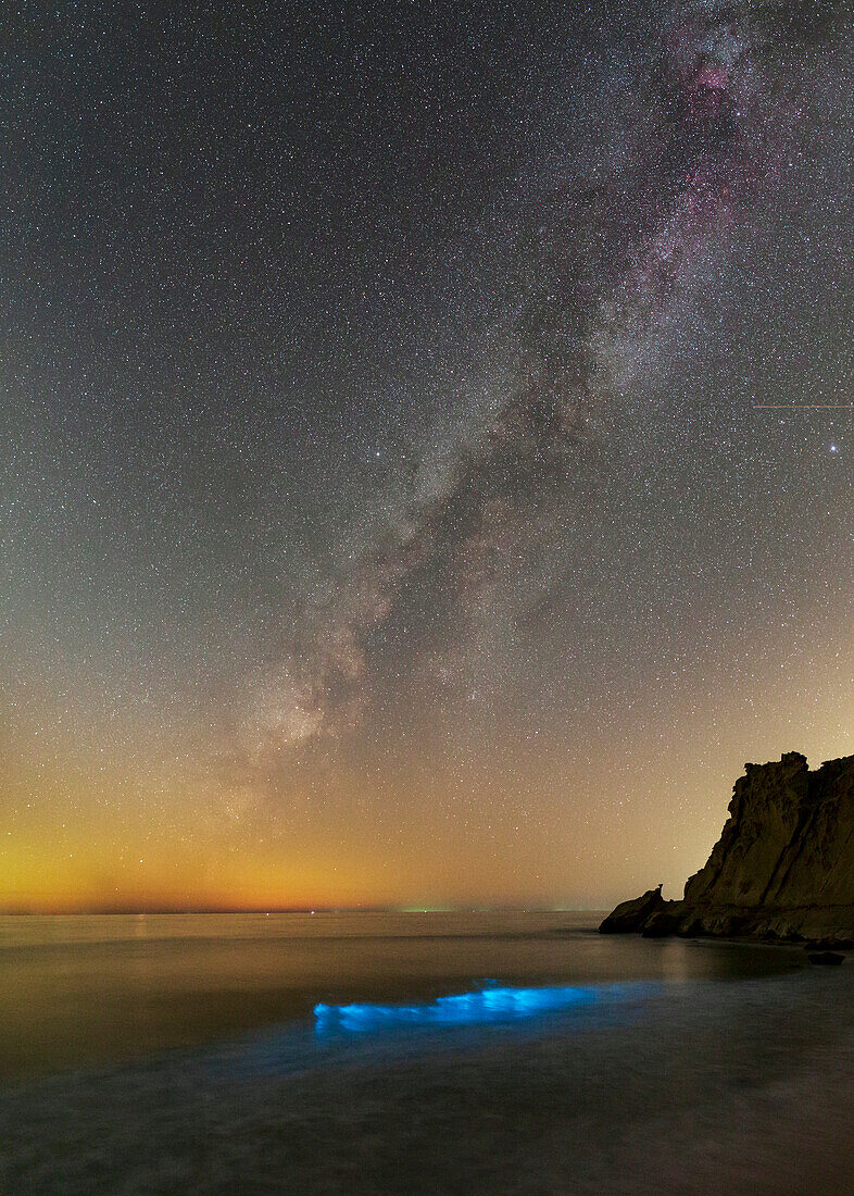 Milky Way and bioluminescent plankton