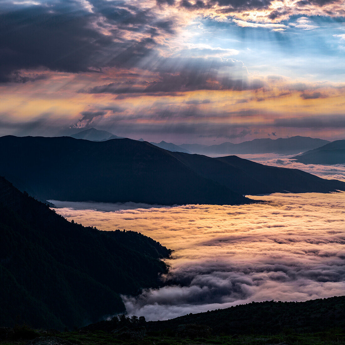 Sun rays on sea of clouds