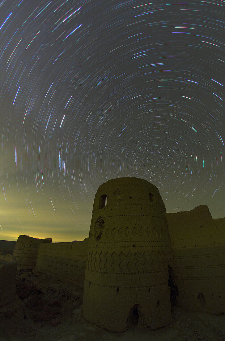 Northern star trails over castle, Iran