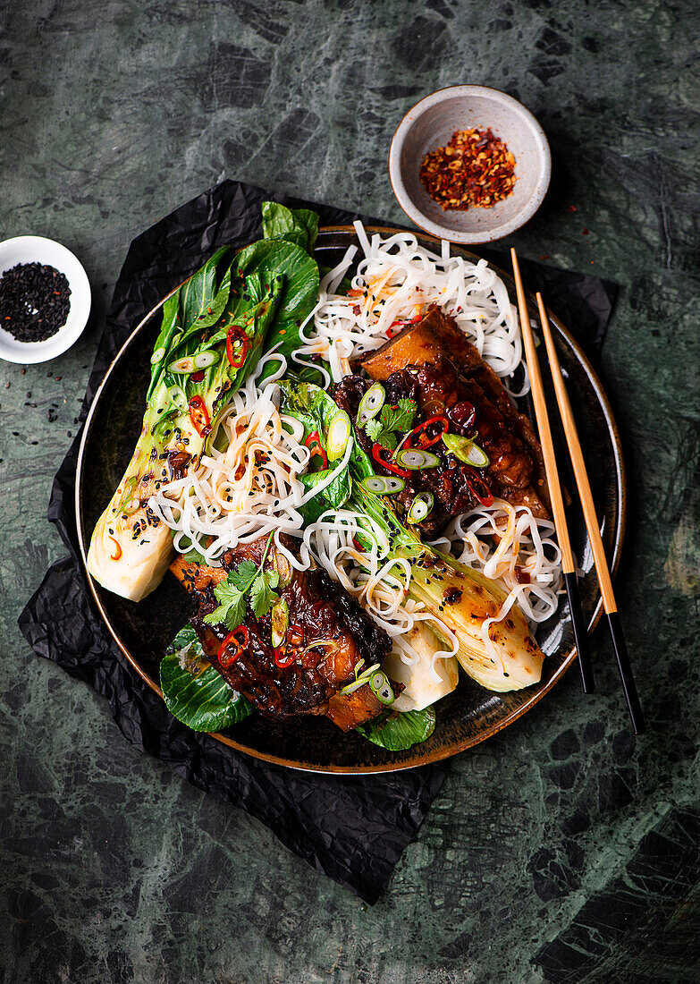 Korean style beef ribs with bok choi and rice noodles