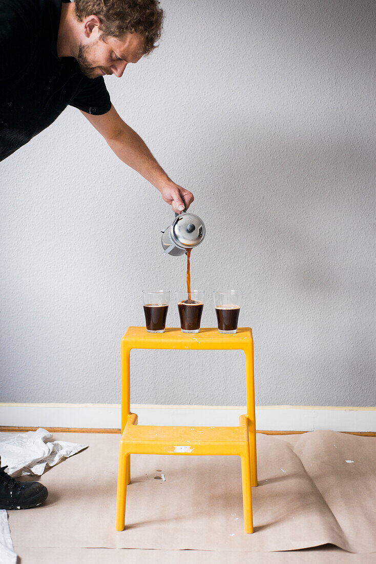 Man pouring coffee