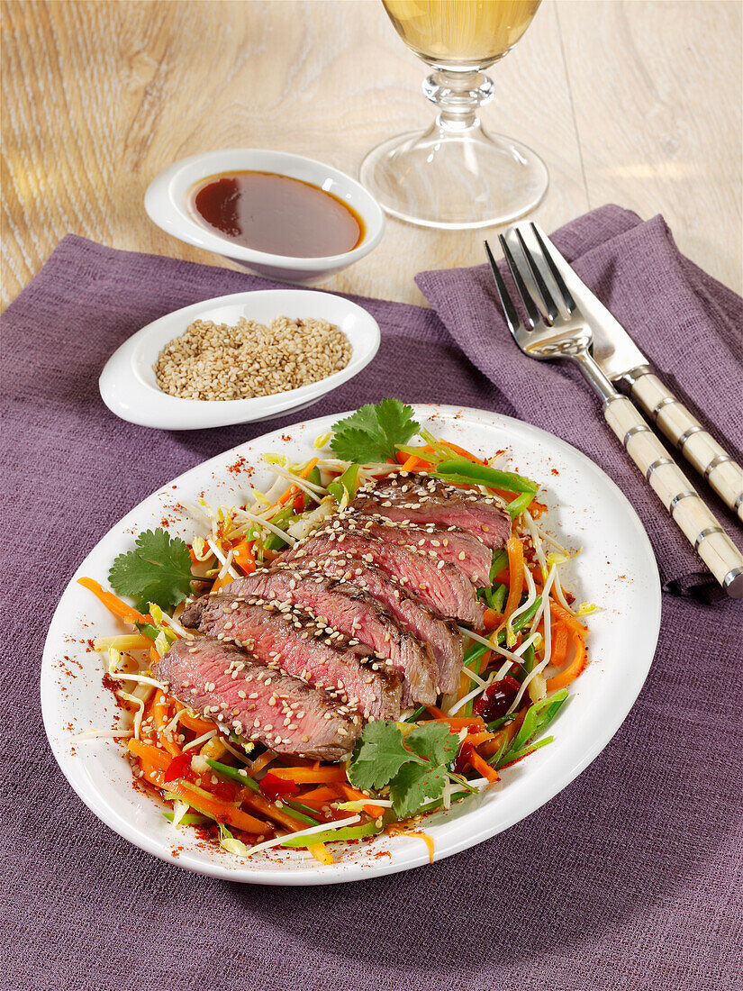 Asian beef salad with sesame seeds