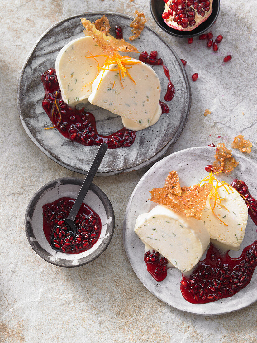 Basil and orange parfait with pomegranate sauce