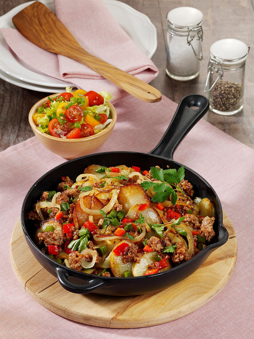 Fried minced meat and potatoes with peppers