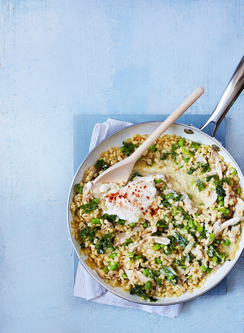 Barley risotto with chicken, beans and kale