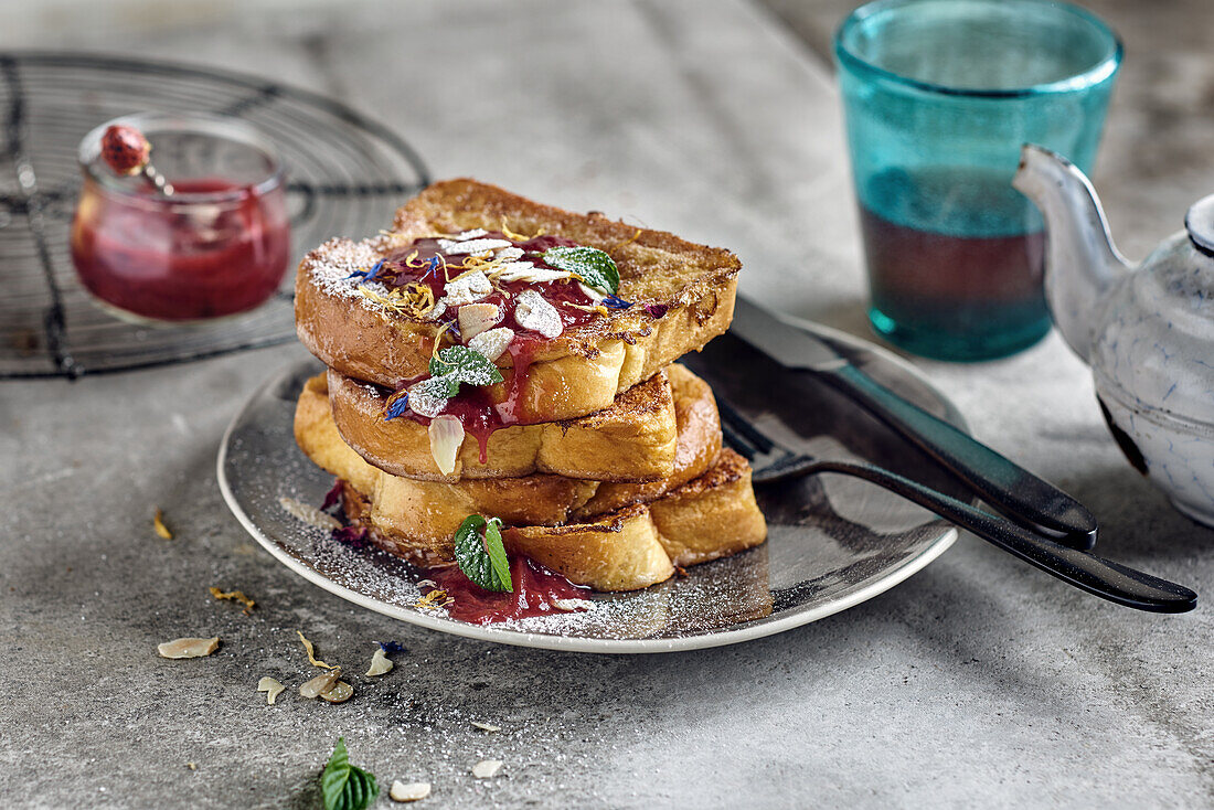 French toast with jam, toasted almonds, and mint