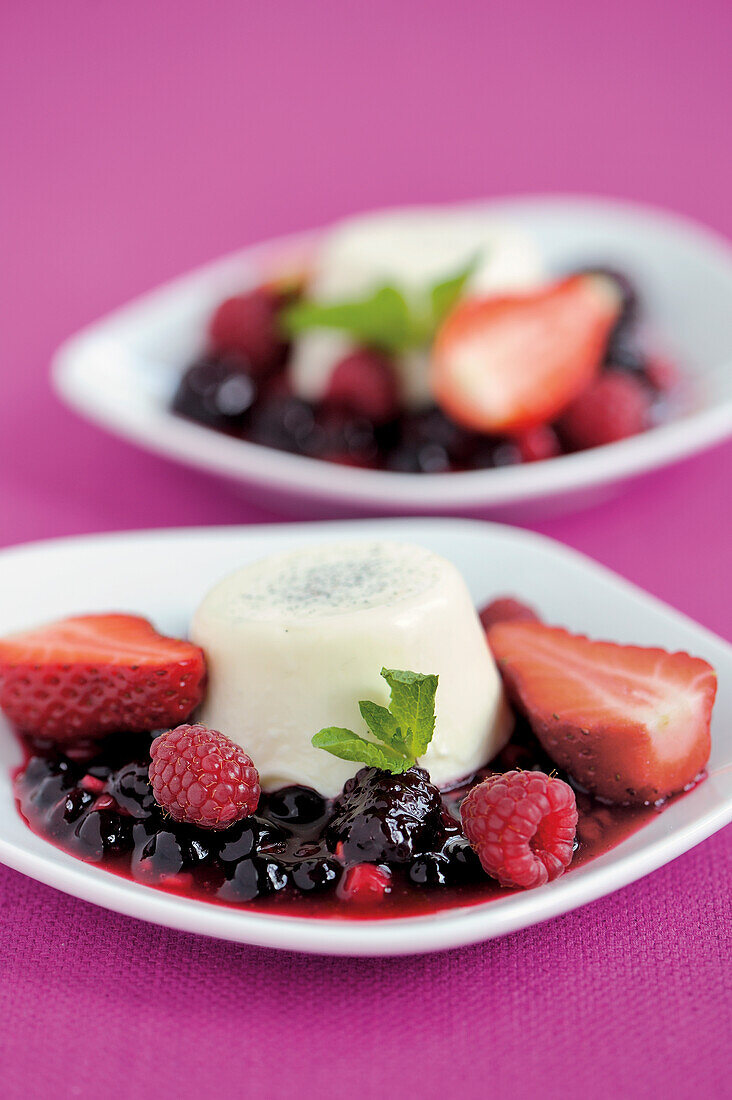 Coconut panna cotta on a port wine-and-berry sauce