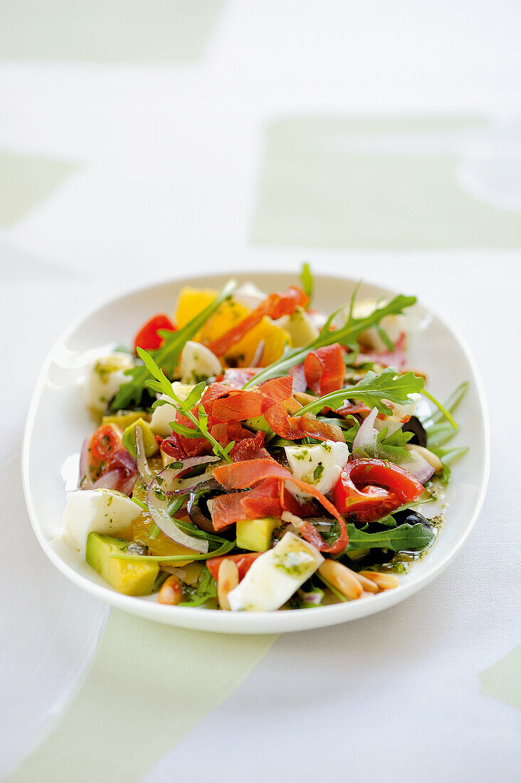 Rocket-and-avocado salad with oranges, mozzarella and prosciutto