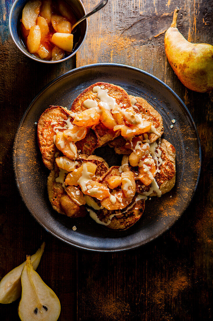 Vegan oat pancakes with carmelized pears and almonds