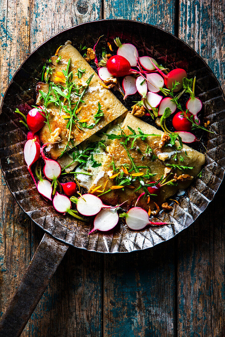 Buckwheat crepes with radishes