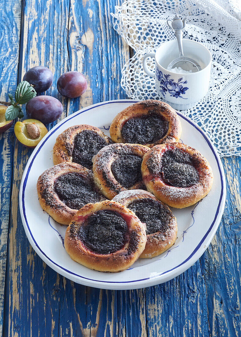 Plum cakes with poppy seed