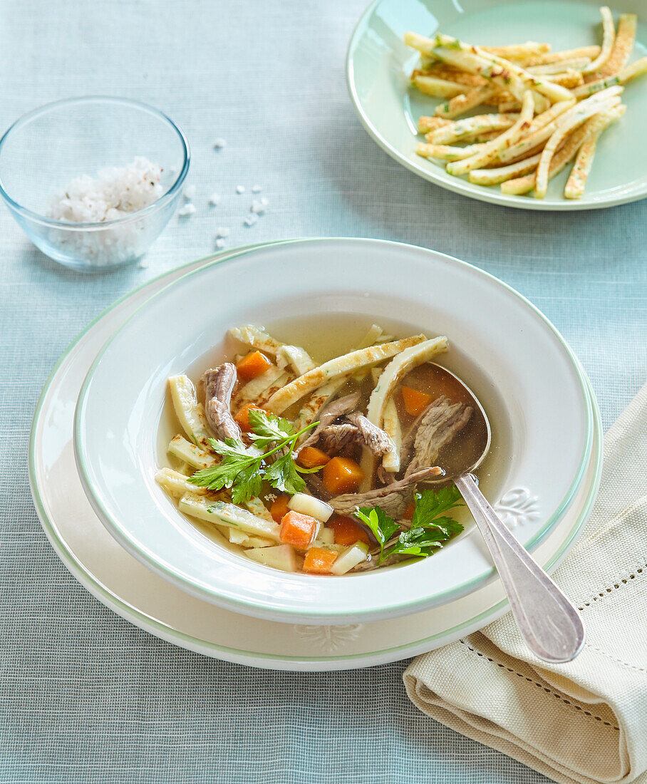 Beef broth with pancake noodles