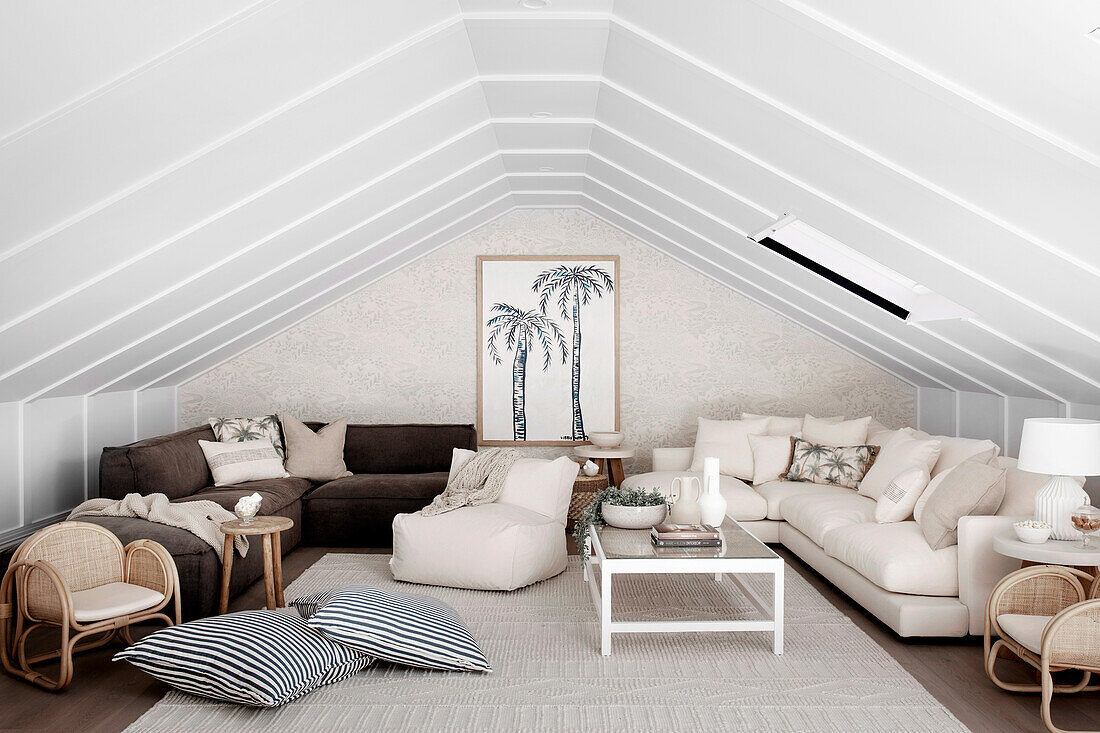 Brown and natural white upholstered furniture, beanbag and cushions in the attic room