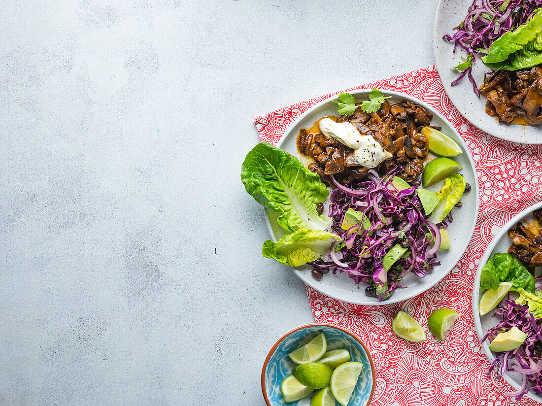 BBQ Pulled Mushroom with red cabbage, black beans and avocado salad