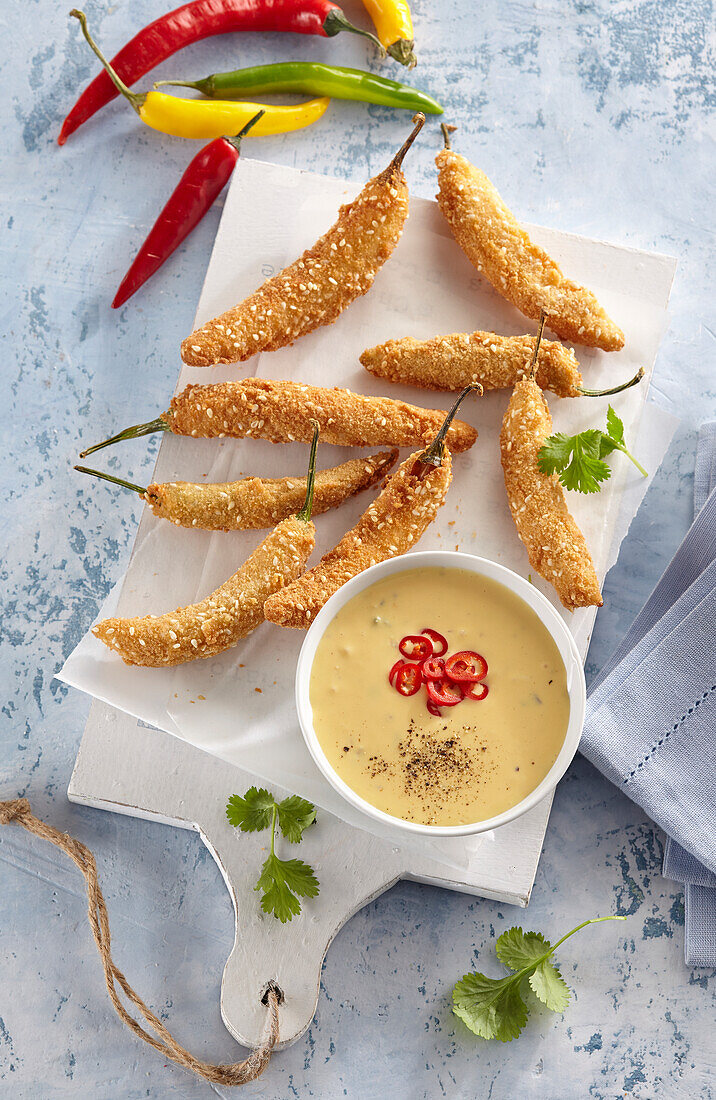 Fried spicy chili peppers with Cheddar dip