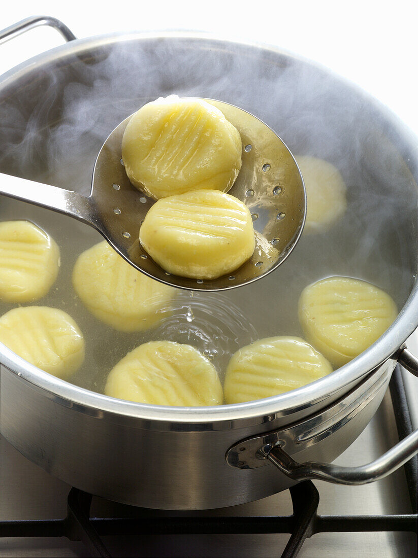 Gnocchi being cooked
