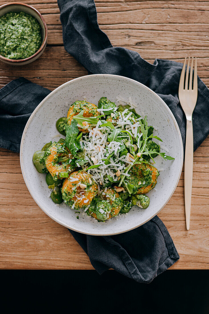 Sweet potato dumplings with pesto and broad beans