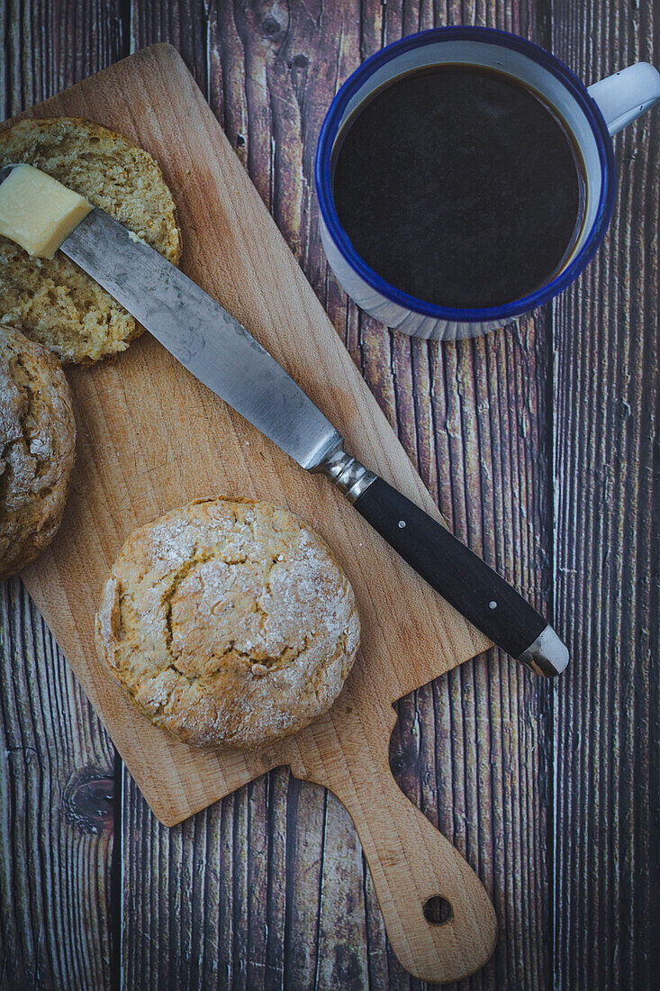 Scones with butter and coffee