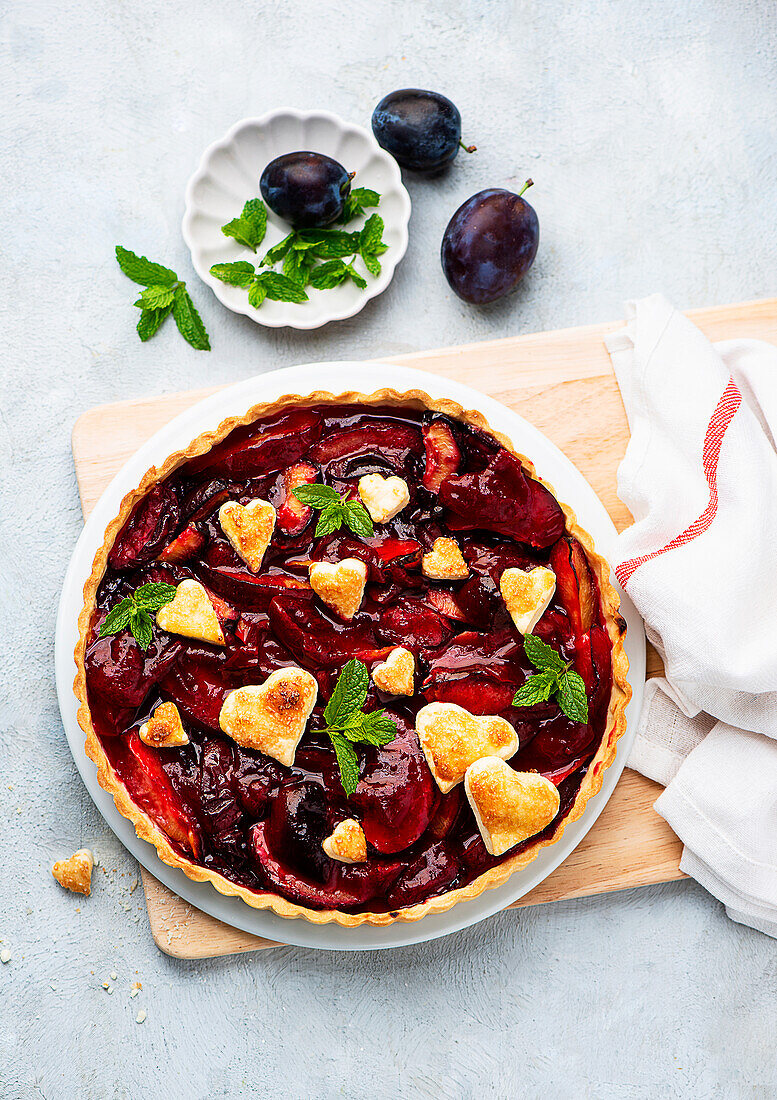 Damson tart with puff pastry hearts
