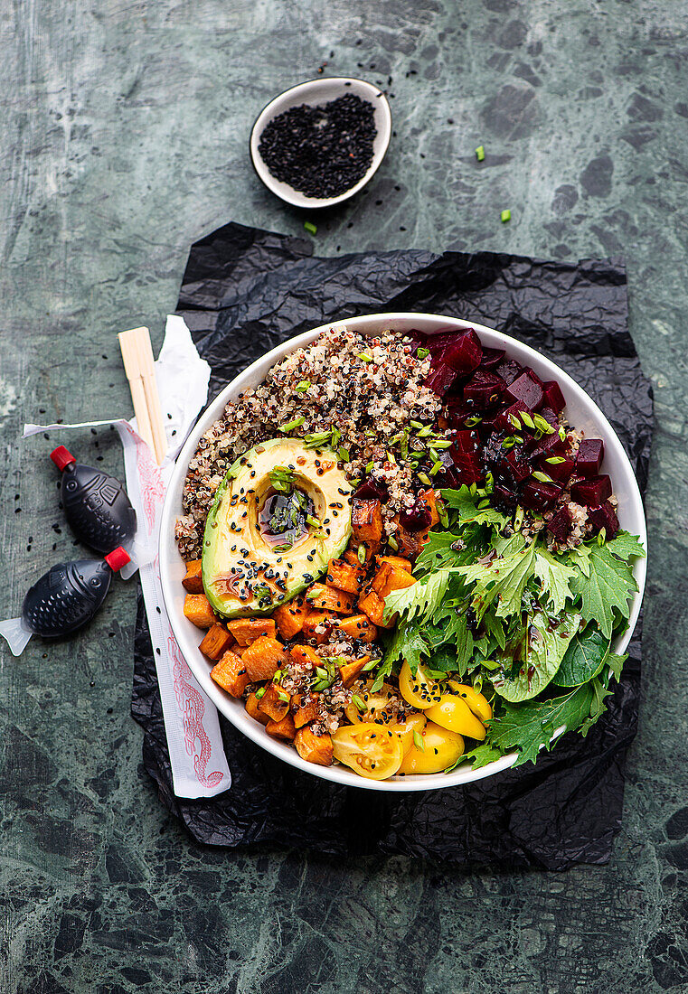 Vegan bowl with beetroot, avocado and quinoa