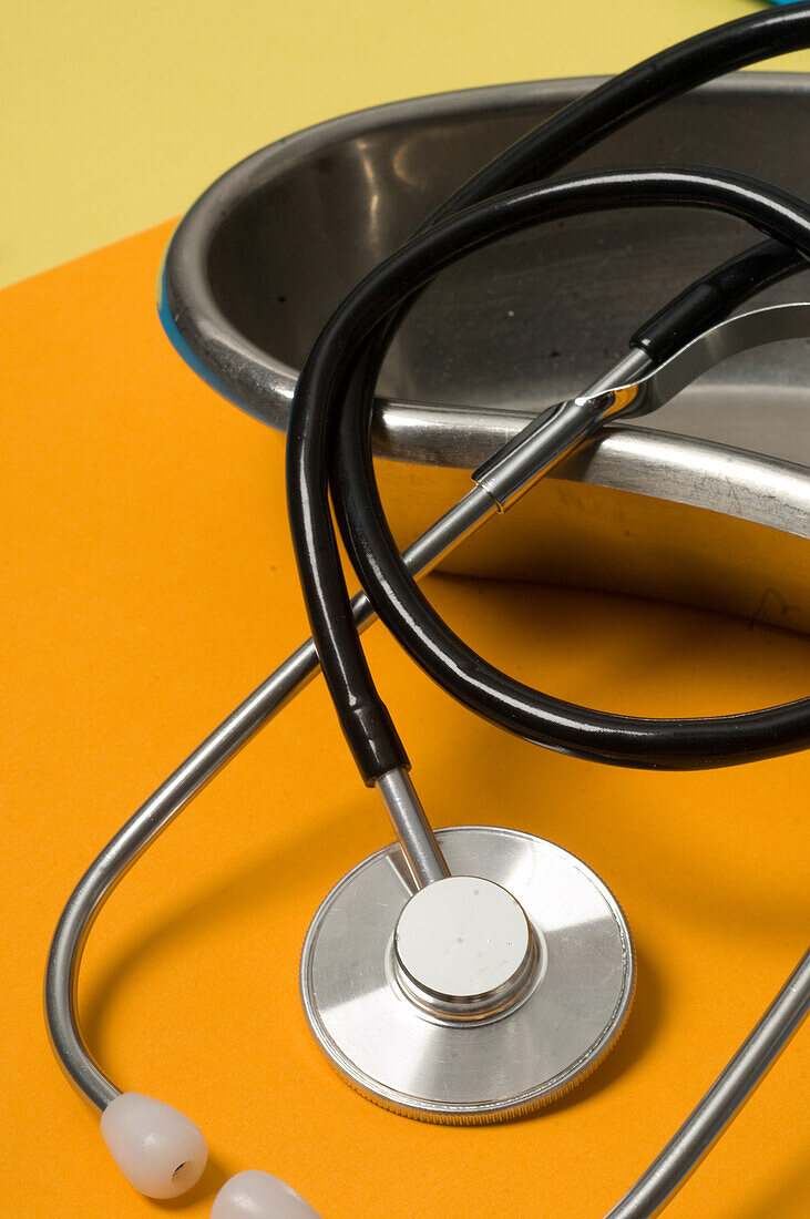 Stethoscope and metal kidney dish