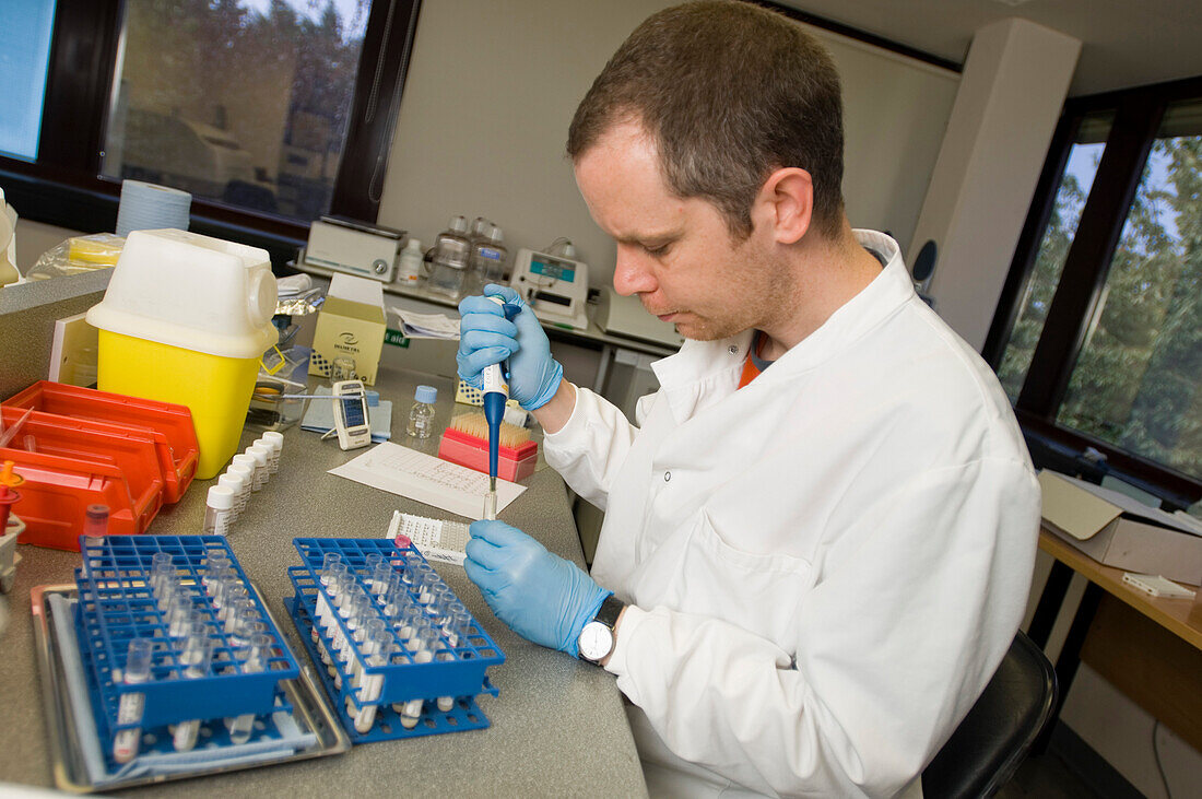 Sample being placed into a test plate