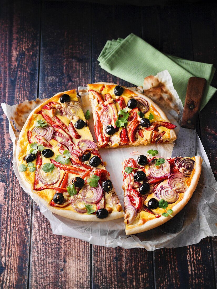 Oriental pepper tart with olives and red onions