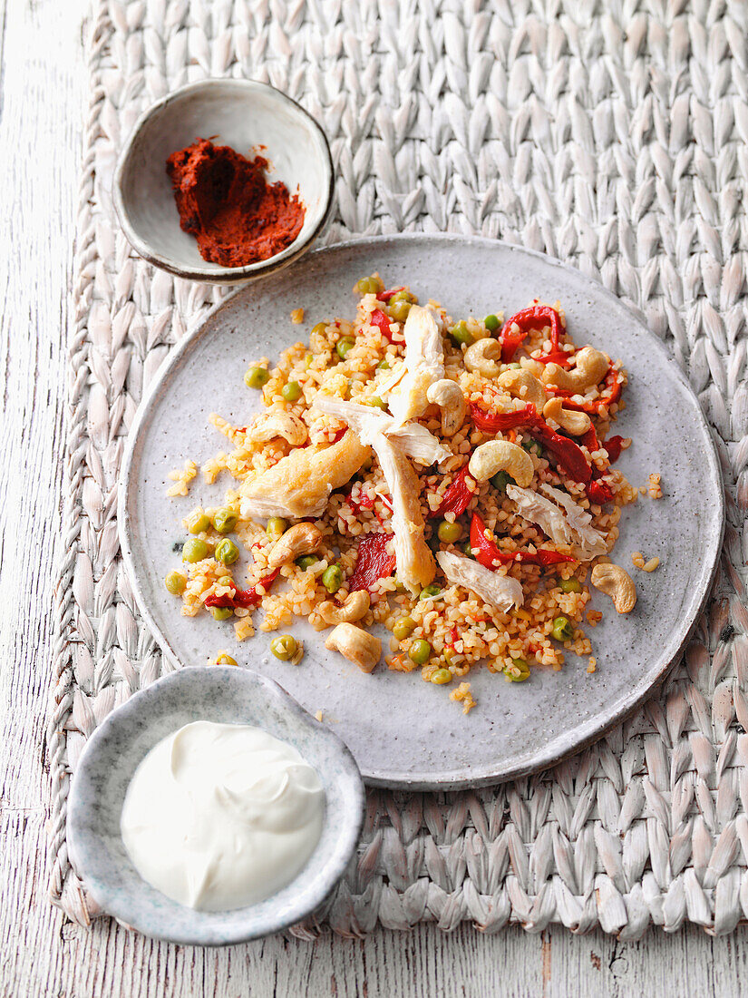 Spicy bulgur with peppers and cashew nuts