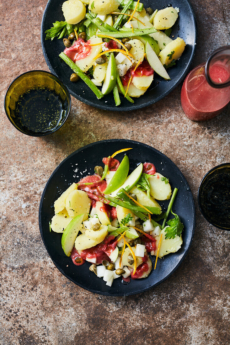 Potato and apple salad with beetroot dressing