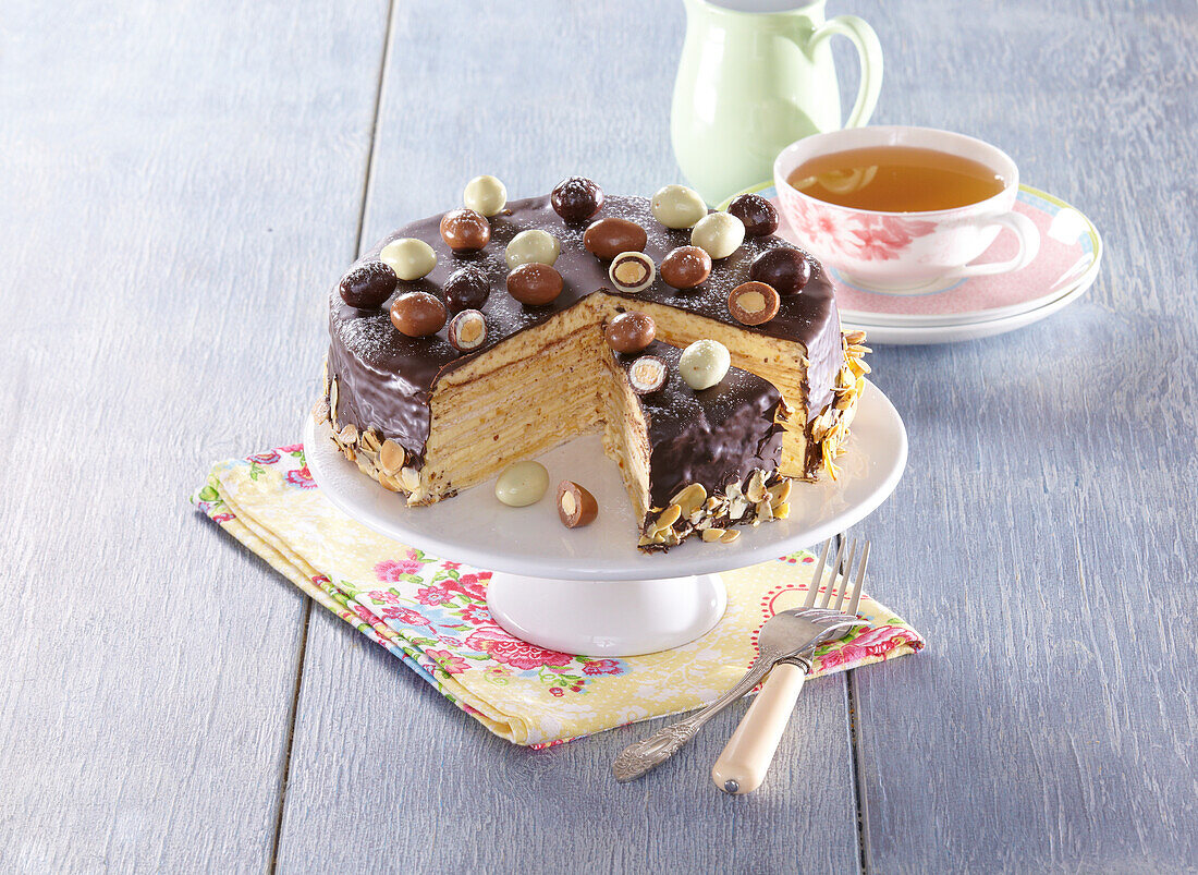 Waffle-almond cake with chocolate icing and chocolate eggs