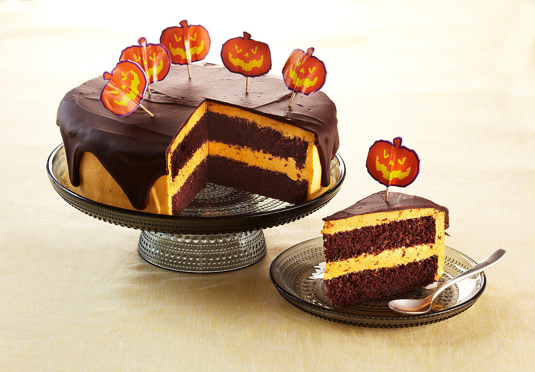 Cocoa cake with pumpkin cream and chocolate glaze