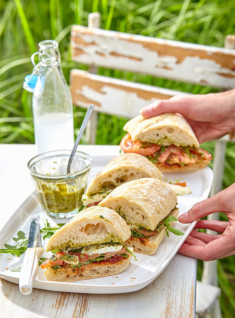 Caprese sandwiches with homemade basil pesto