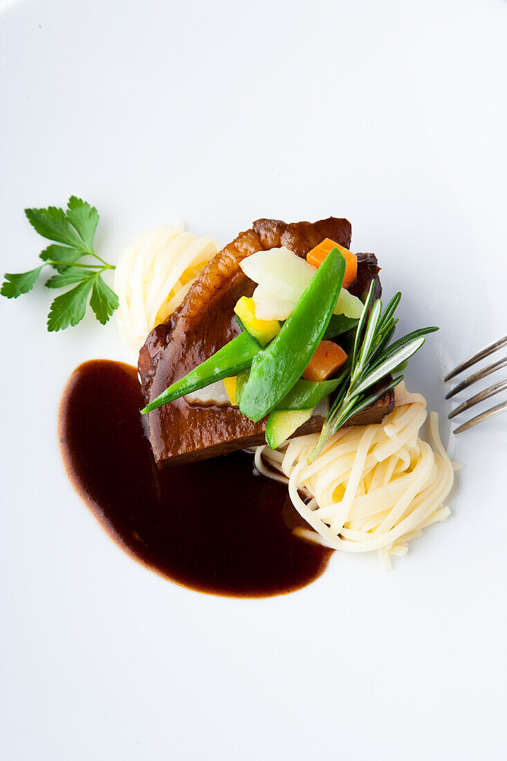 Beef boiled fillet braised in Burgundy with fine vegetables