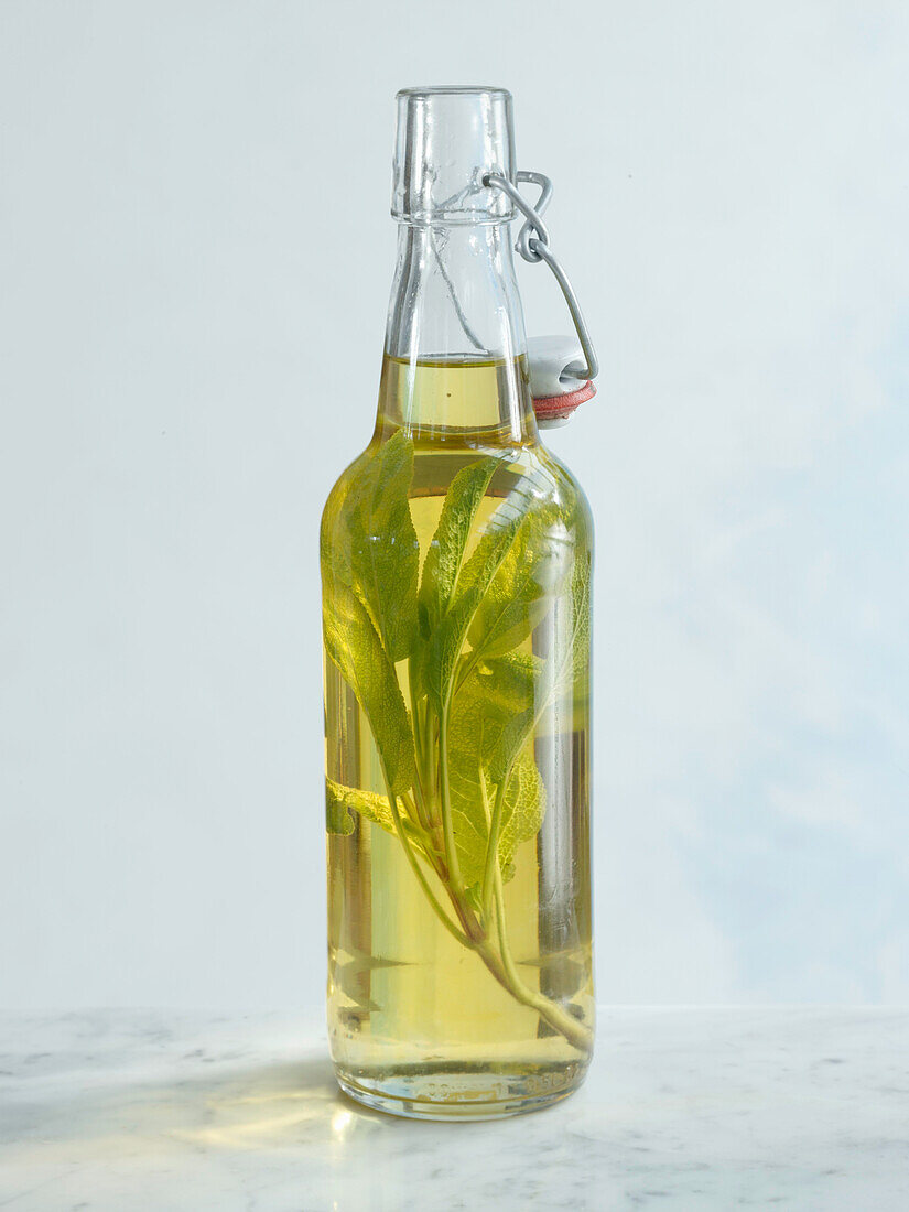 Sage oil in a flip-top bottle