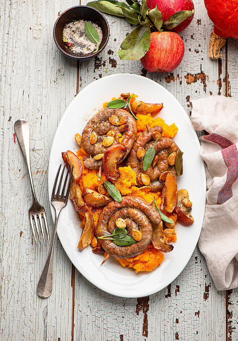 Coiled sausage with apple, sage and pumpkin puree