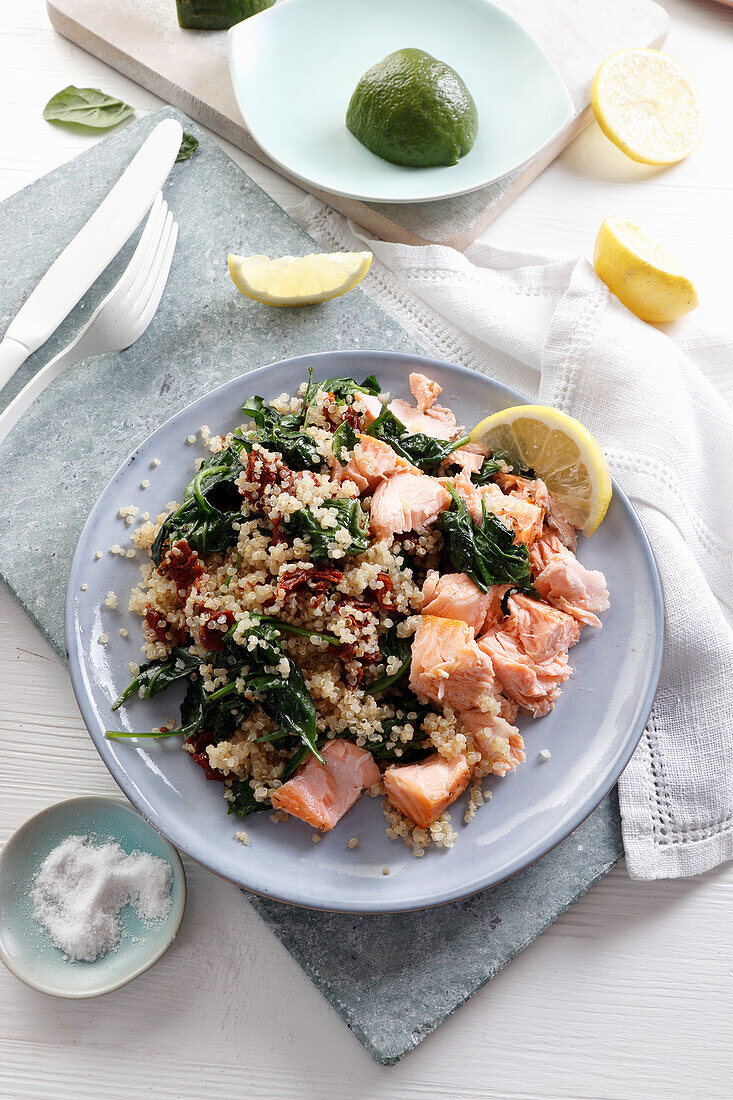 Quinoa with stewed spinach and baked salmon