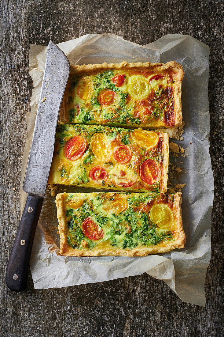 Quiche with wild garlic (ramp) and colored tomatoes