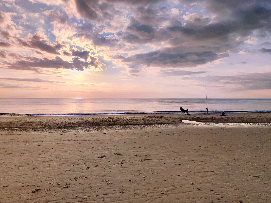 Anglers on the North Sea beach in Denmark