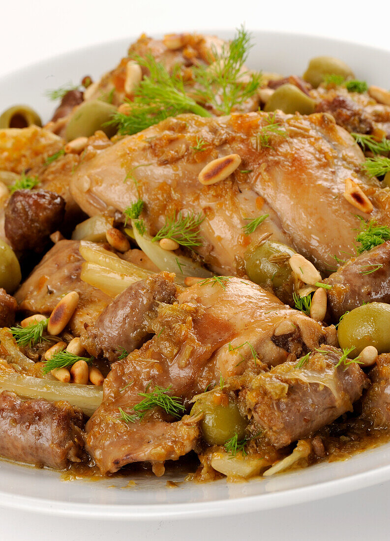 Rabbit with fennel, pine nuts, and olives