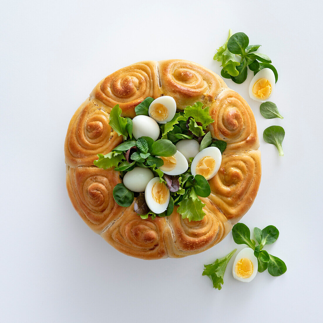 Hearty brioche cake with boiled eggs for Easter