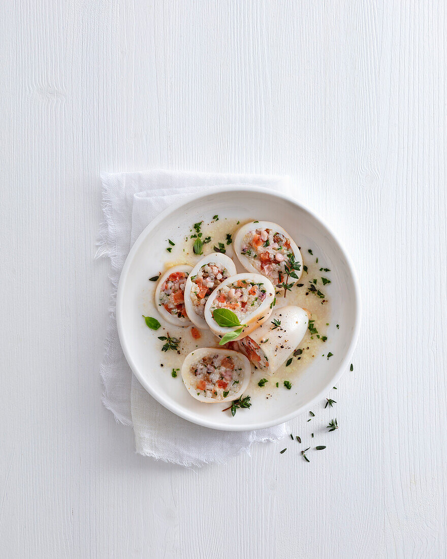 Squid stuffed with sultana rice and pine nuts