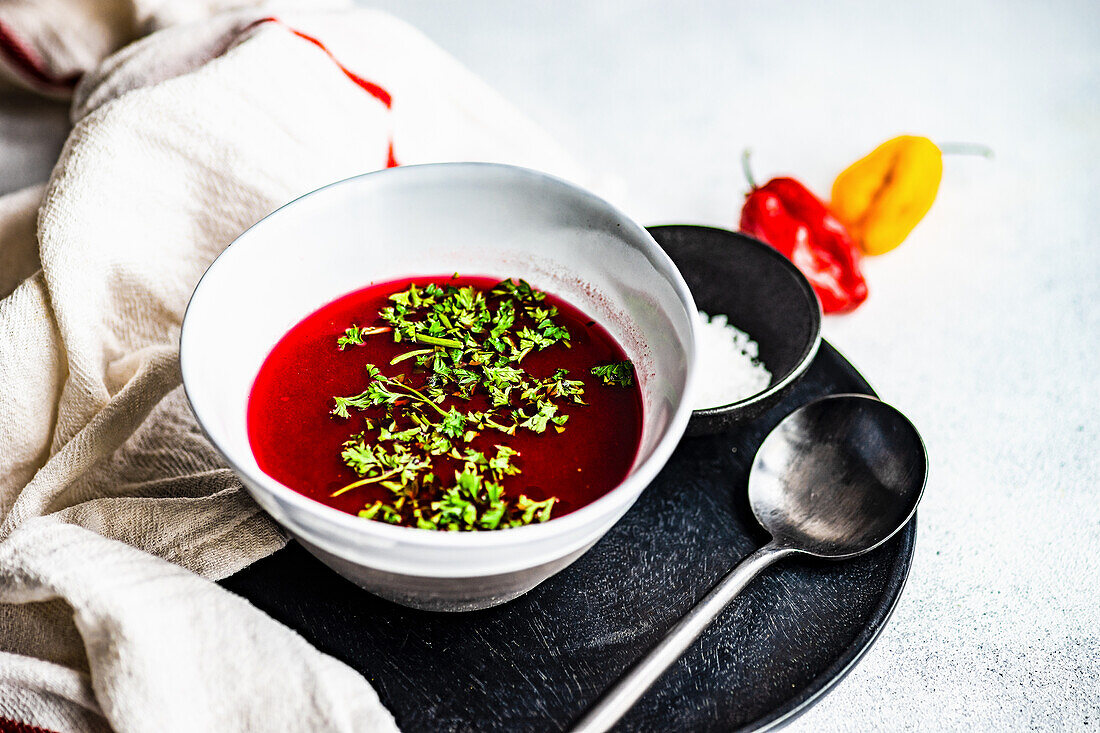 Healthy beetroot cream soup chilli pepper and parsley