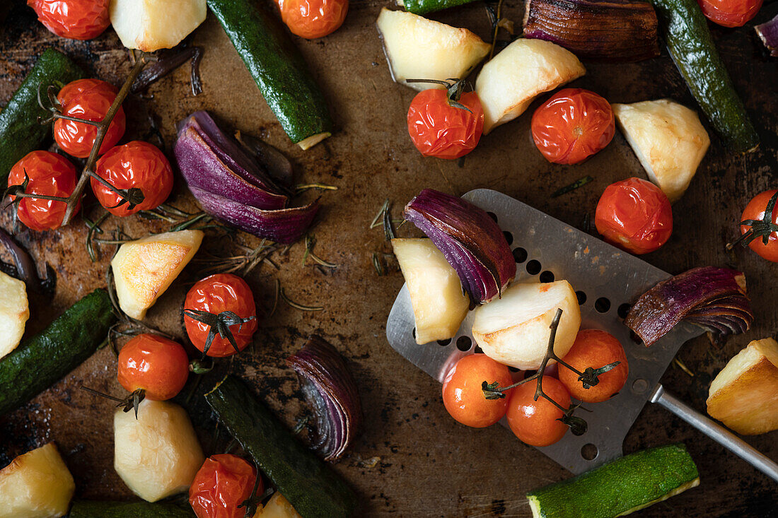 Selection of roasted vegetables on a baking tray