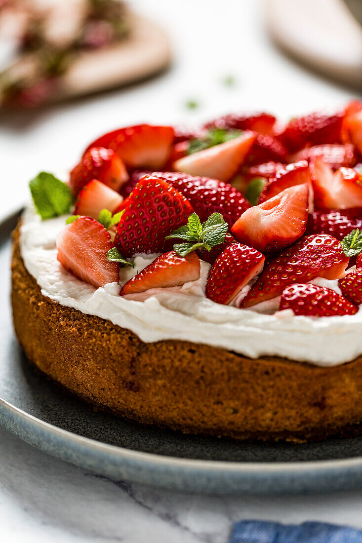 A homemade strawberry cake, made with almond flour