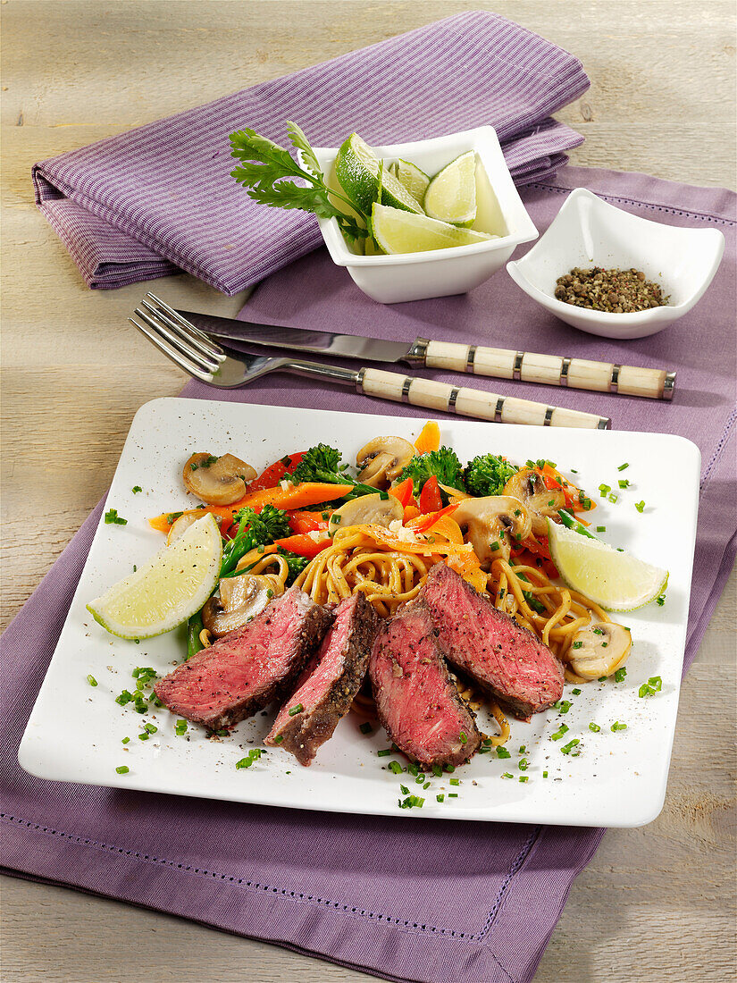 Asian steak with ramen noodles and vegetables