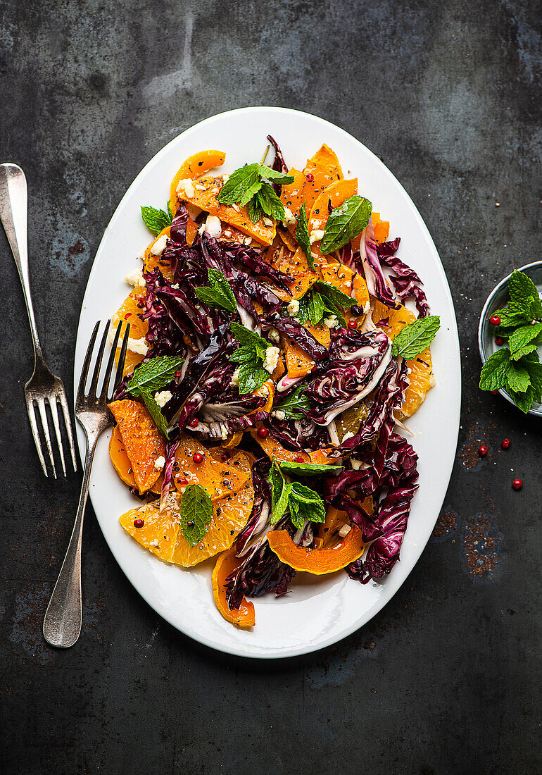 Roasted pumpkin salad with oranges and goat cheese