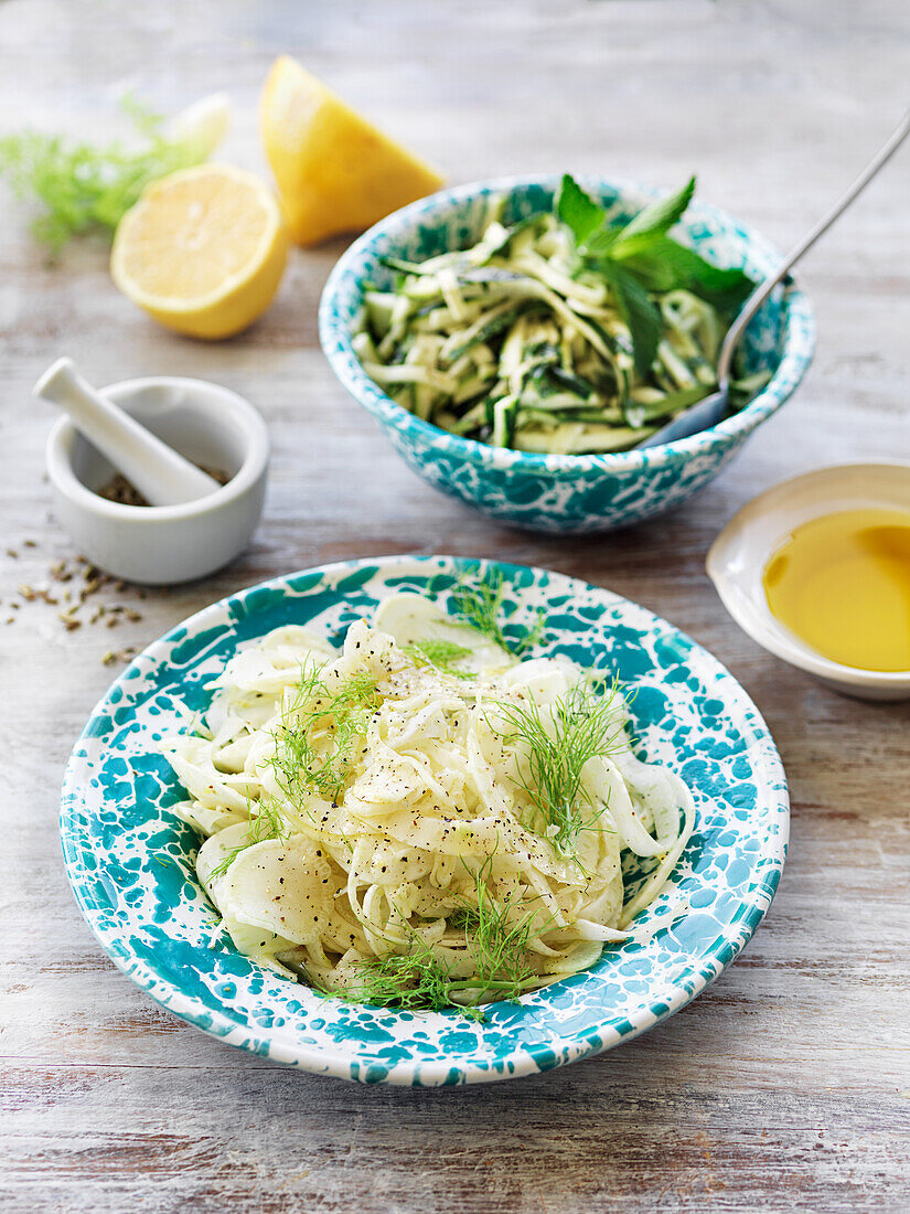 Salad with fennel and lemon and salad with zucchini and lemon