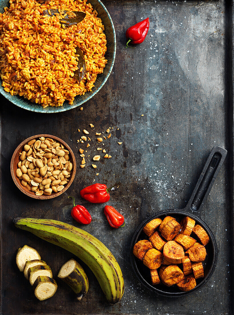 Fried bananas, fried spicey rice, chilis and peanuts