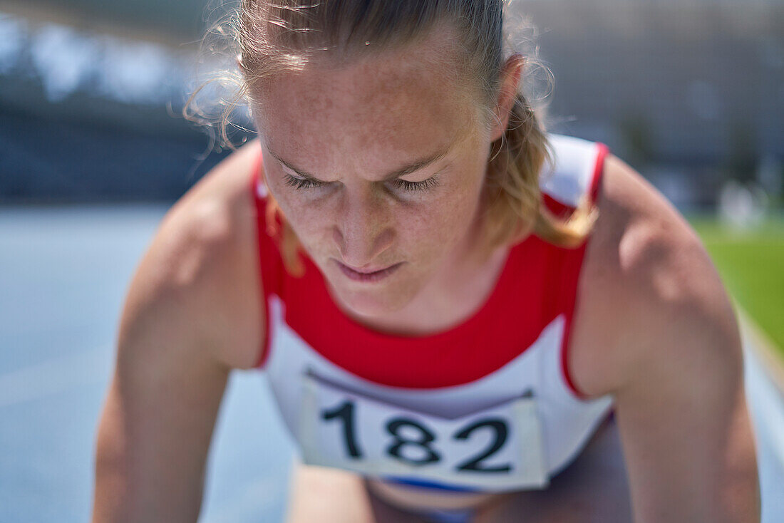 Focused athlete preparing for race