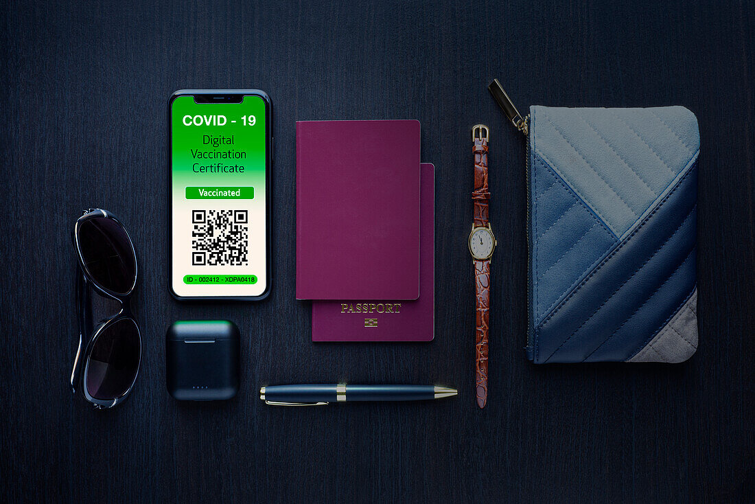 Covid passport, wristwatch, wallet and sunglasses